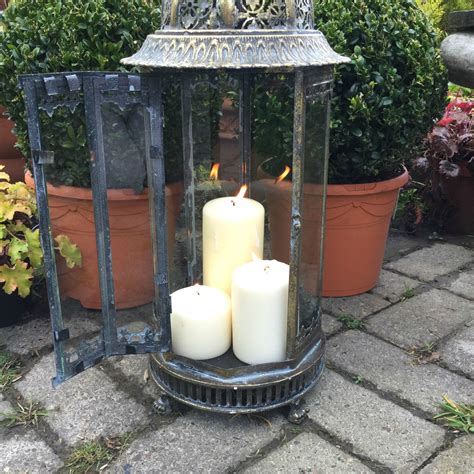 Shop pottery barn for outdoor string lights to illuminate your next outdoor gathering. Extra Large Metal Garden Lantern Candle Holder Antique ...
