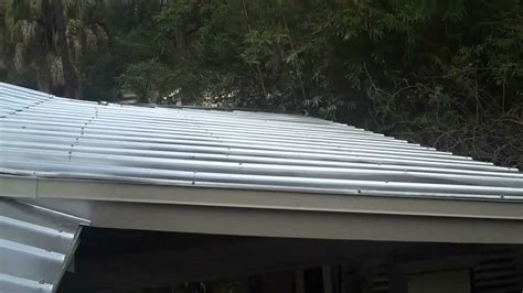 Paint will not adhere to your metal roofing unless you apply an etching primer first. Painting Metal Roof Integrity Finishes - YouTube