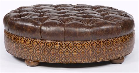 Leather oversized chair and ottoman. Large round tufted leather ottoman. American furniture.