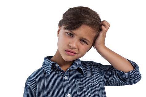 Depressed Boy Standing Against White Background Stock Photo Download