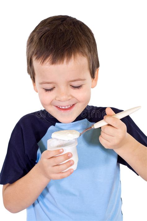 Happy Healthy Boy Eating Yogurt Stock Photo - Image of child, milk: 8056304