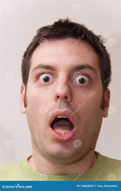 Young Man Looking Scared And Shocked Stock Photo Image Of Offended