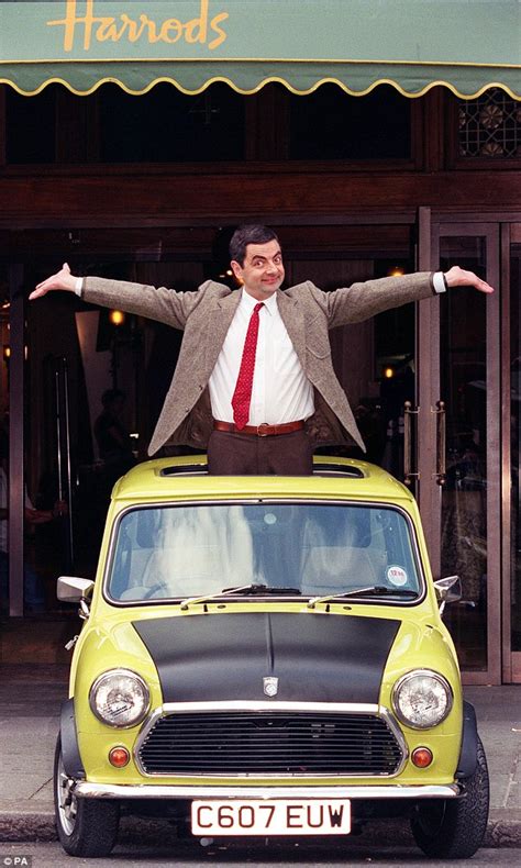 Mr Bean Enjoys A Spin Outside Buckingham Palace To Celebrate 25th