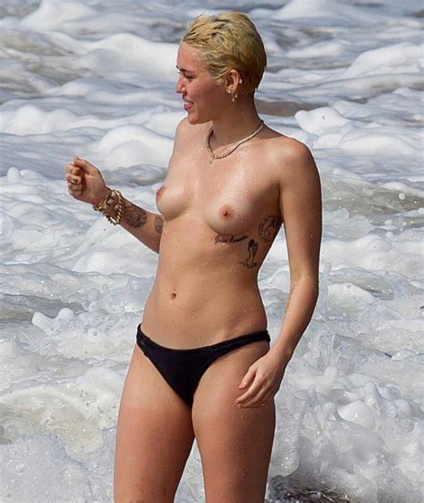 Celebrity Miley Cyrus Is Topless At The Beach