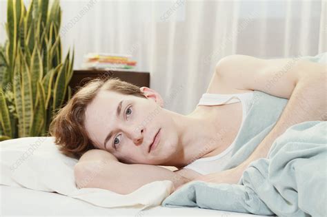 Start date apr 26, 2013. Man laying in bed - Stock Image - F004/9500 - Science ...