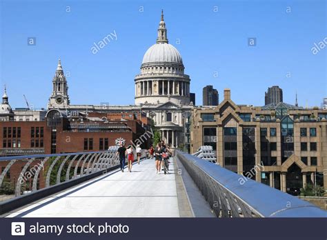 St Pauls Cathedral From The Millennium Bridge In London Uk Stock
