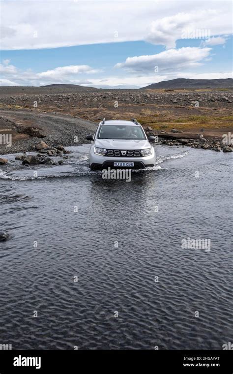 Dacia Duster 4x4 Car Crossing A River Ford Gravel Road Barren