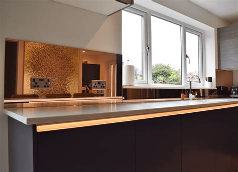 Magnificent white kitchen with mirror splashback. Copper Mirror Splashback (Non-Toughened) | Glass ...