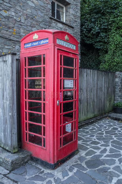 Traditional Old English Phone Booth With The Modern Technologies Stock