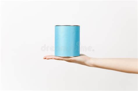 Close Up Of Female Hand Horizontal Holds Blue Empty Paint Tin Can With