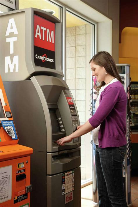 Cardtronics Buys Canadian Atm And Financial Services Provider