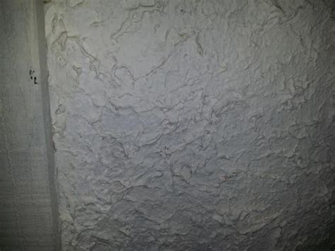 After the drywall was finished, it was time to mud. Removing Stucco like, very thick texture on walls ...