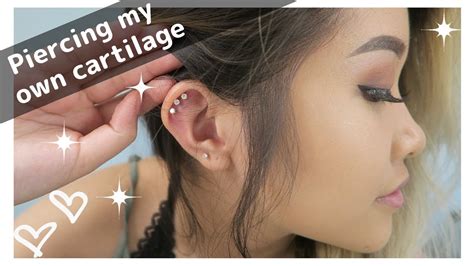 piercing my triple cartilage at home youtube