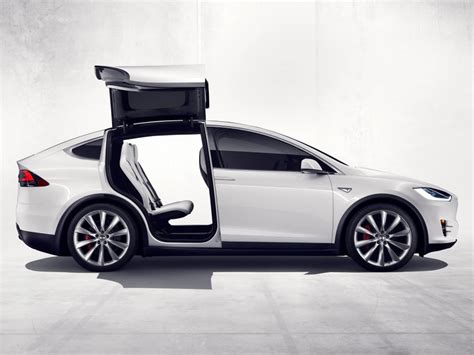 Tesla Had Problems With Its Falcon Wing Doors — But Crazy Car Doors