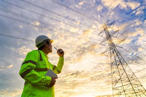 Asian Engineer Use Radio Checks At A Power Station For Planning Work By