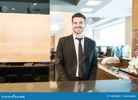 Mid Adult Receptionist Standing At Lobby In Hotel Stock Image Image Of Lobby Smiling