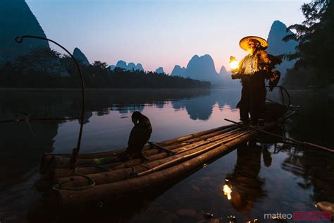 Fisherman With Cormorants On The Li River Near Guilin China
