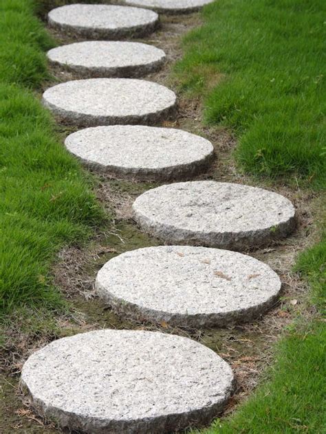 25 Ways To Beautify Your Yard Without Planting A Thing Garden Stepping Stones Stepping Stone