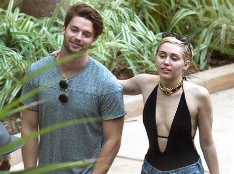 Miley Cyrus Topless Beach Day Out With Patrick Schwarzenegger Bollywood News And Gossip Movie