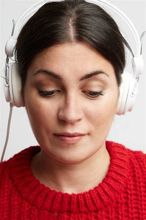 Portrait Of Young Woman Listening The Music In Her Headphone Vertical