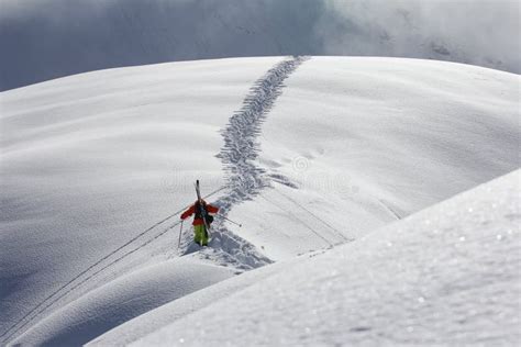 Skier Climbing A Snowy Mountain Stock Image Image Of Risk Alps 35445971