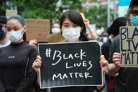 Anti Racism Protesters March Throughtout Japan Cities