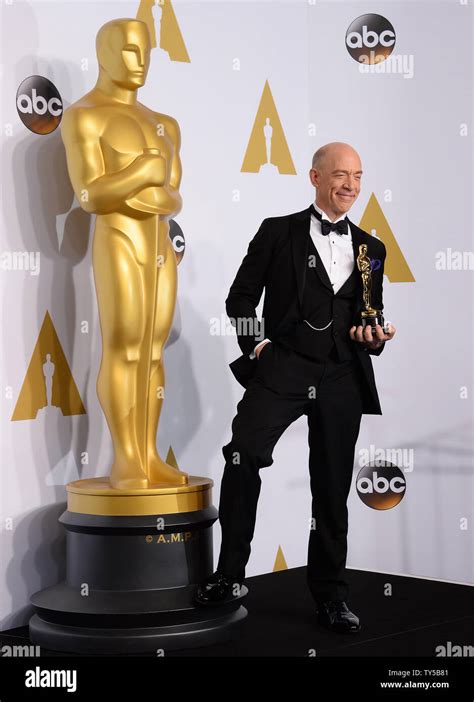 j k simmons winner of best supporting actor for role in whiplash poses backstage with his