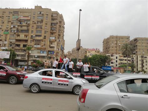 مسيرة بالسيارات تجوب شوارع جامعة الدول العربية لحث المصريين على التصويت