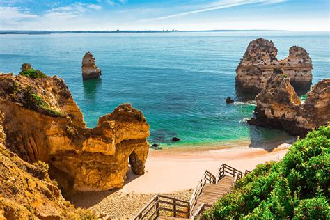 Praia do camilo beach acquired its name for having a restaurant named o camilo on top of the cliff. 9 mind-blowing beaches in Lagos, Portugal - Wapiti Travel