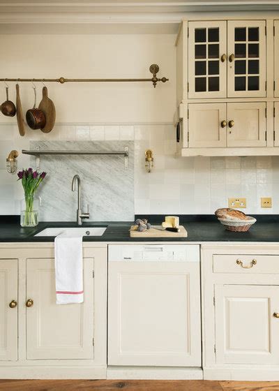 Just take a look at these combinations. 7 Colors That Enhance Cream Kitchen Cabinets