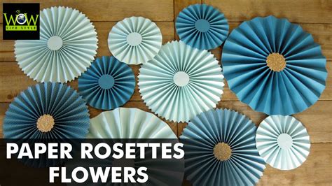 Adults will have to help with the cutting but kids can help decorate the snowflakes or even draw out their own designs. How to Make Paper Rosettes Flowers | Paper Pinwheels ...