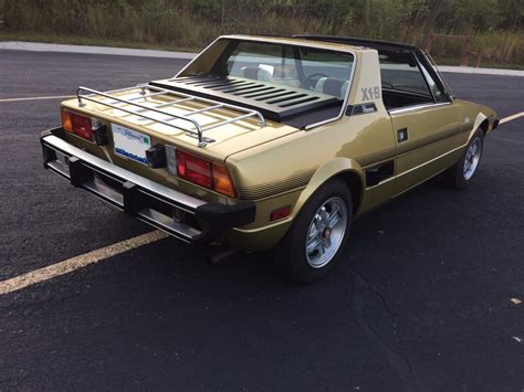Rust in lots of panels but main subframe is all good. 41k-Mile 1978 Fiat X1/9 for sale on BaT Auctions - sold ...
