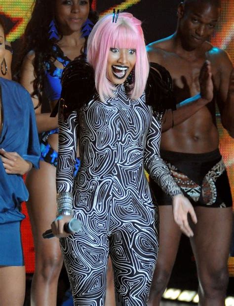 The 25 Most Daring Outfits Nicki Minaj Has Ever Worn Nicki Minaj Singer Fashion Futurism Fashion