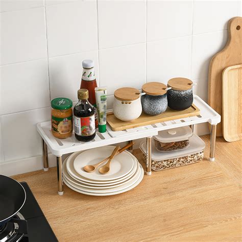 Ships free orders over $39. Under Kitchen Sink Shelf Storage Adjustable Cupboard Rack ...