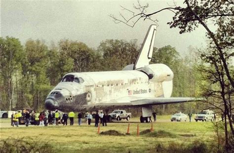 Photos Space Shuttle Discovery Hoisted Toward New Home Business Insider