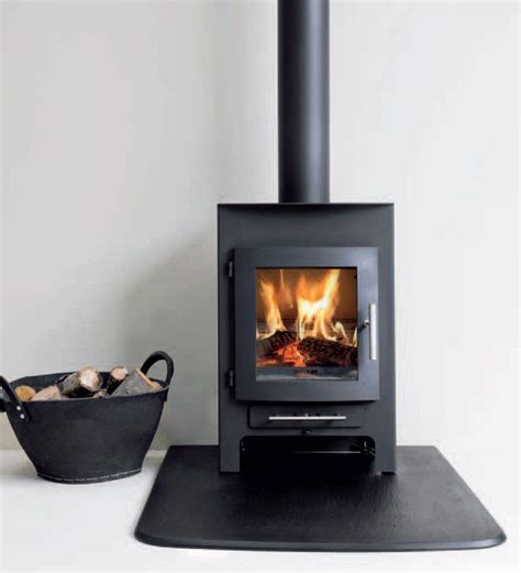 A scandinavian wood stove heats a modern space with an open floorplan. The 25+ best Scandinavian freestanding stoves ideas on ...