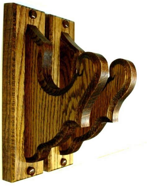 Have a bunch of nerf guns laying around and want to get them out of the way and also add an awesome nerf gun rack to your room? Oak Wooden Gun Rack Hangers Rifle Shotgun Classical Wall ...