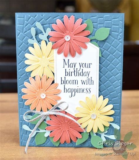 A Birthday Card With Flowers On It