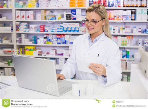 What type of memory is lost when a person turns off the computer? Pharmacist Using The Computer Stock Photo - Image of ...