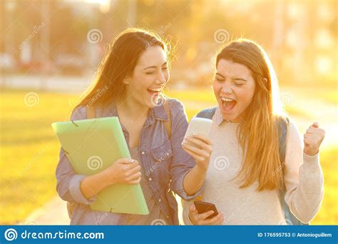 excited-students-checking-exam-results-on-phone-outside-stock-image-image-of-approval,-excited