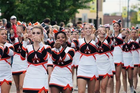 The Ames High School Cheerleaders Cheer On The Little Cyclones During Mondays Homecoming Parade
