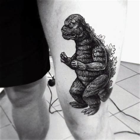 Dark Shaded Godzilla Tattoo On Mans Leg Monsters Ink Sea Monsters Tattoos For Guys Tattoos