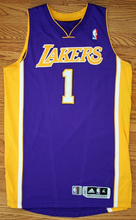 Jersey is a gold pro style magic johnson jersey and the name and numbers are stitched onto jersey. Lot Detail - 2013-14 Jordan Farmar Game Worn Lakers Jersey ...