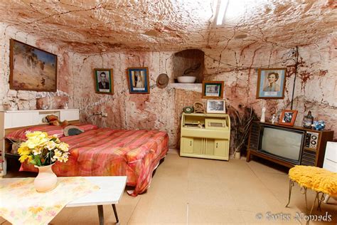 The shape of the house appears to be as a seashell viewed from the beach. Coober Pedy, a town where people live underground ...