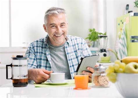Man Having Breakfast And Social Networking Stock Image Image Of Connecting Online 130864057