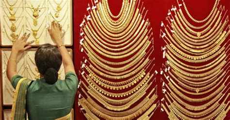 What is the tanishq golden harvest scheme? Should you invest in gold buying schemes by jewellers?