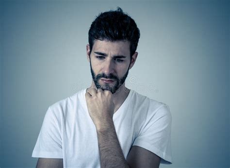 Portrait Of Sad And Intimidated Man Isolated In White Background