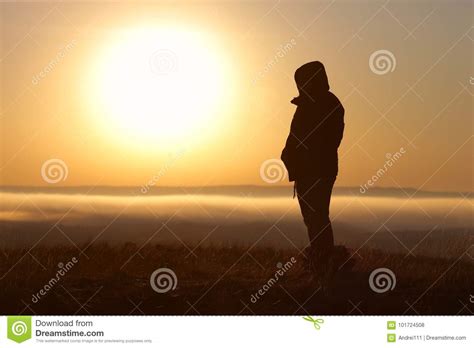 Strong Girl Standing Facing The Sun Stock Photo Image Of Sunset