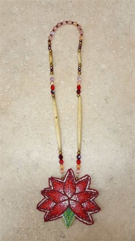 Expensive silks, fabric, polychrome fabrics, and glass beads came over from. NICE HAND CRAFTED CUT BEADED FLOWER DES. ROSETTE NATIVE ...