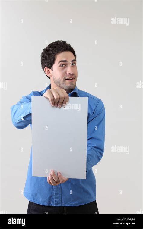 Man Holding Blank Paper Stock Photo Alamy